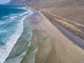 Aerial view of Famara beach, Lanzarote, Canary Islands, Spain. Risco di Famara, relief, mountains overlooking the Atlantic Ocean