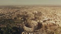 Aerial view of famous Colosseum or Coliseum amphitheatre within cityscape of Rome, Italy Royalty Free Stock Photo