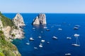 Aerial view of famous Faraglioni cliffs and Tyrrhenian sea on a beautiful summer day on Capri island in Italy Royalty Free Stock Photo