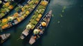 Aerial view famous floating market. Farmer go to sell organic products, fruits, vegetables and Thai cuisine Royalty Free Stock Photo