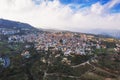 Aerial view of famous landmark valley Pano Lefkara village, Larnaca, Cyprus with orange ceramic roofs, drone photo Royalty Free Stock Photo