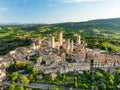 Aerial view of famous medieval San Gimignano hill town with its skyline of medieval towers, including the stone Torre Grossa. Royalty Free Stock Photo