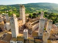 Aerial view of famous medieval San Gimignano hill town with its skyline of medieval towers, including the stone Torre Grossa. Royalty Free Stock Photo