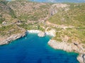 Aerial view of the famous rocky beach Foneas near Kardamyli village in the seaside Messenian Mani area during high tourist Summer Royalty Free Stock Photo