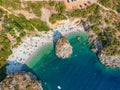 Aerial view of the famous rocky beach Foneas near Kardamyli village in the seaside Messenian Mani area during high tourist Summer Royalty Free Stock Photo