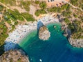 Aerial view of the famous rocky beach Foneas near Kardamyli village in the seaside Messenian Mani area during high tourist Summer Royalty Free Stock Photo