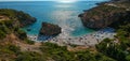 Aerial view of the famous rocky beach Foneas near Kardamyli village in the seaside Messenian Mani area during high tourist Summer Royalty Free Stock Photo