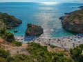 Aerial view of the famous rocky beach Foneas near Kardamyli village in the seaside Messenian Mani area during high tourist Summer Royalty Free Stock Photo