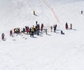 Aerial view famous ski resort. Skiers skiing on the mountain. Ski lift. Family sports weekend, holidays in the snow mountains Royalty Free Stock Photo