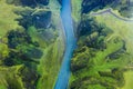 Aerial view of famous and unique Fjadrargljufur valley in Iceland on a rainy day in Iceland. Mossy cliffs and mountain