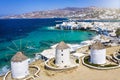 Aerial view through the famous windmills above Mykonos town, Greece