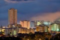 Aerial view of fancy hotels and apartment buildings lit up brighly in Sea Point, Cape Town, South Africa at night. An Royalty Free Stock Photo