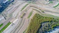 Aerial view of farm field hills, terraced valley with massive agricutlure