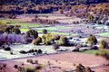 Aerial view of farm fields and trees and some farm houses in Hepirus area, Greece