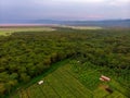 Aerial view on Farm plantation on the Edge with a Primal Virgin Forest of Manyara National Park Concervation Area in Royalty Free Stock Photo