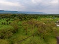 Aerial view on Farm plantation on the Edge with a Primal Virgin Forest of Manyara National Park Concervation Area in Royalty Free Stock Photo