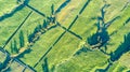 Aerial view on a farmland with roads and livestock paddock on a hills near New Plymouth. Taranaki region, New Zealand Royalty Free Stock Photo