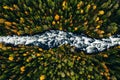 Aerial view of fast river flow through the rocks and colorful forest. Autumn in Finland Royalty Free Stock Photo