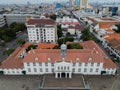 Aerial View. Fatahilah museum at Old City at Jakarta, with Jakarta cityscape. Indonesia. JAKARTA, INDONESIA - DECEMBER, 30, 2020 Royalty Free Stock Photo