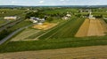 Aerial View Featuring Roads Intersecting Near Construction Site Amidst Farmland With Fields Royalty Free Stock Photo