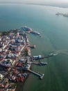 Aerial view ferry arrive Penang Jetty. Background is cruise ship visit Penang.