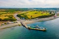 Aerial view of a ferry by the coast of Chiloe Island in Chacao channel