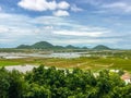the aerial view of the field with mountain and sea near Thach Dong & x28;stone cave& x29;, Ha Tien city, Kien Giang, Vietnam Royalty Free Stock Photo