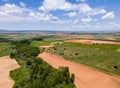 Aerial view of fields of Castile with agricultural plots and blue sky with clouds Royalty Free Stock Photo