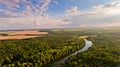 Aerial view of fields, forest, river.