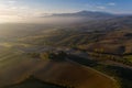 Aerial view of the fields, wineries near San Quirico d`Orcia. Tuscany autumn sunrise