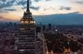 Aerial view of financial skyscrapers displaying time on digital clock at night in Mexico City under cloudy sky Royalty Free Stock Photo