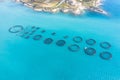 Aerial view, fish farm with floating cages in the Mediterranean sea Royalty Free Stock Photo