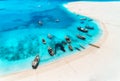 Aerial view of the fishing boats and yachts on tropical sea coast Royalty Free Stock Photo