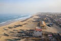 Aerial view of fishing village, pirogues fishing boats in Kayar, Senegal.  Photo made by drone from above. Africa Landscapes Royalty Free Stock Photo