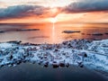 Aerial view of fishing village on seashore in winter at sunrise