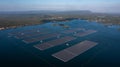 Aerial view floating solar cell power plant with solar cell generate the electric on the lake, Floating solar panels and cell