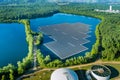 Aerial view of floating solar panels cell platform on the lake