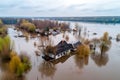 Aerial view of the flooded village in autumn. Flooded house. Generative AI