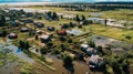 Aerial view of the flooded village. Flooded houses. Concept of ecological catastrophe. Generative AI.