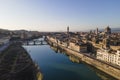 Aerial view of Florence skyline along Arno river with Ponte Vecchio and Santa Maria del Fiore church, Tuscany, Italy Royalty Free Stock Photo