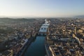 Aerial view of Florence skyline along Arno river at sunset with Ponte Vecchio bridge in foreground, Florence, Tuscany, Italy Royalty Free Stock Photo