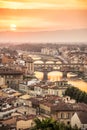 Aerial view of Florence at sunset with the Ponte Vecchio and the Arno river, Tuscany Italy Royalty Free Stock Photo