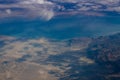 Aerial view fluffy clouds above desert landscape and Suez Gulf in Egypt Royalty Free Stock Photo