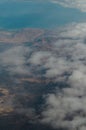 Aerial view fluffy clouds above desert landscape and Suez Gulf in Egypt Royalty Free Stock Photo