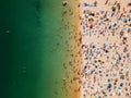 Aerial View From Flying Drone Of People Crowd Relaxing On Algarve Beach Royalty Free Stock Photo