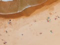 Aerial View From Flying Drone Of People Crowd Relaxing On Algarve Beach Royalty Free Stock Photo