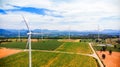 Aerial view from flying drone wind turbine at the day.