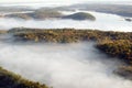 Aerial view of fog in autumn over islands and hills north of Portland Maine Royalty Free Stock Photo