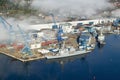 Aerial view of fog over Bath Iron Works and Kennebec River in Maine. Bath Iron Works is a leader in surface combatant design and Royalty Free Stock Photo