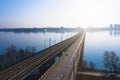 Aerial view of fog over Voronezh river and North Bridge with car traffic, drone shote from above, morning haze and cityscape Royalty Free Stock Photo